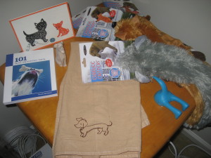 Here are a few of the gifts I'll be giving away to celebrate the launch of Loose Dogs!