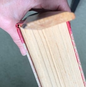 fixing a broken book keep the pages pressed against the spine until the adhesive dries2