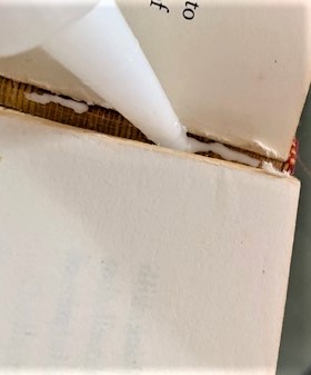 fixing a broken book run a bead of the adhesive down the inside of the spine